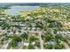 Gorgeous aerial view of a lakeside community filled with mature trees and tranquil streets at 1330 Lakeview Rd, Lake Wales, FL 33853