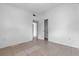 Bedroom with neutral tile floors and a large closet to store belongings at 1330 Lakeview Rd, Lake Wales, FL 33853