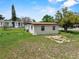 Exterior of the property showing the grassy lawn and window details at 1330 Lakeview Rd, Lake Wales, FL 33853