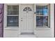 Classic front door entrance with sidelight windows and visible house number above the entryway at 1330 Lakeview Rd, Lake Wales, FL 33853