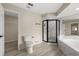 Bathroom with a corner glass shower, a toilet, and a tub at 15690 Sw 46Th Cir, Ocala, FL 34473