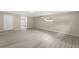 Spacious bedroom with modern floors, neutral tones, and ample natural light at 15690 Sw 46Th Cir, Ocala, FL 34473