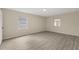 Bedroom features wood flooring, neutral walls, and bright, natural light at 15690 Sw 46Th Cir, Ocala, FL 34473