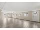 Spacious living room with tile floors, multiple windows, and neutral color palette at 15690 Sw 46Th Cir, Ocala, FL 34473