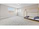 Inviting bedroom showcasing plush carpet, natural light, and a unique house-frame bed, creating a cozy atmosphere at 16013 Silver Brook Way Way, Winter Garden, FL 34787
