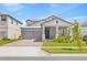 Charming two-story home with a well-manicured lawn and welcoming front porch at 16013 Silver Brook Way Way, Winter Garden, FL 34787
