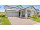 Beautiful home with a spacious driveway and attached two-car garage at 16013 Silver Brook Way Way, Winter Garden, FL 34787