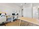 Bright office space with desks, chairs, and views of a bathroom and closet at 16013 Silver Brook Way Way, Winter Garden, FL 34787