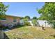 Backyard showcasing a well-maintained lawn and privacy fence at 1732 Oasis Ave, Deltona, FL 32725