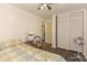 Bedroom with neutral decor, closet and view of en suite bathroom at 1732 Oasis Ave, Deltona, FL 32725