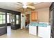 Screened in back porch featuring washer and dryer hookups at 1732 Oasis Ave, Deltona, FL 32725