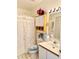 Bathroom featuring shower with tub and vanity with classic accents at 204 Holland St, Lake Wales, FL 33859
