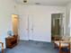 Bedroom with two closets and bathroom entrance at 204 Holland St, Lake Wales, FL 33859