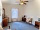 Spacious bedroom with blue carpet and ample natural light at 204 Holland St, Lake Wales, FL 33859