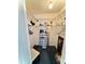 Walk-in closet with adjustable shelving and ample storage space at 204 Holland St, Lake Wales, FL 33859