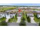Aerial view of property showcasing the home's layout, neighborhood, and proximity to amenities at 2130 Bur Oak Blvd, St Cloud, FL 34771