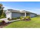 Beautiful single-Gathering home with manicured lawn, tasteful landscaping, and a covered entrance at 2130 Bur Oak Blvd, St Cloud, FL 34771