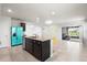 Modern kitchen with island, stylish pendant lighting, and stainless steel appliances at 2130 Bur Oak Blvd, St Cloud, FL 34771