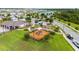 A community playground offers outdoor fun with colorful slides and climbing equipment, surrounded by green space at 2130 Bur Oak Blvd, St Cloud, FL 34771