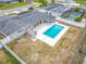 Aerial view of a home with a private backyard pool and mature landscaping at 2203 Beatrice Dr, Orlando, FL 32810