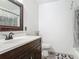 A neutral-colored bathroom with a modern vanity and sink at 2203 Beatrice Dr, Orlando, FL 32810