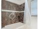 Bathroom showing the bathtub, tile detail and shower curtain at 2203 Beatrice Dr, Orlando, FL 32810