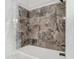 Detailed shower with decorative tile at 2203 Beatrice Dr, Orlando, FL 32810