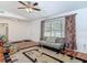 Inviting living room featuring a comfortable seating arrangement and natural light at 2203 Beatrice Dr, Orlando, FL 32810