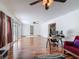 Open living room featuring hardwood floors, natural light, and open floor plan at 2203 Beatrice Dr, Orlando, FL 32810
