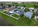An aerial view of a home in a serene neighborhood with a fenced backyard at 2332 Andrews Valley Dr, Kissimmee, FL 34758