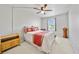 Bedroom with neutral walls, ceiling fan and window at 2332 Andrews Valley Dr, Kissimmee, FL 34758