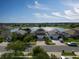 Two-story home featuring a two car garage, well-manicured lawns and beautiful lake views at 2332 Andrews Valley Dr, Kissimmee, FL 34758