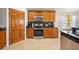Kitchen featuring wood cabinets, granite countertops and stainless steel appliances at 2332 Andrews Valley Dr, Kissimmee, FL 34758