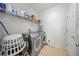 Laundry room with modern washer and dryer at 2332 Andrews Valley Dr, Kissimmee, FL 34758