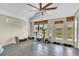 Versatile bonus room featuring tile flooring, lots of natural light and exterior doors at 2391 Piedmont Lakes Blvd, Apopka, FL 32703