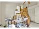 A room with a table and boxes, potentially being used for storage or packing at 2391 Piedmont Lakes Blvd, Apopka, FL 32703