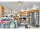 Open kitchen with stainless steel appliances, center island and ample cabinet storage at 2391 Piedmont Lakes Blvd, Apopka, FL 32703
