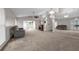 Spacious living room with fireplace, vaulted ceilings, ceiling fan, and access to other rooms in the home at 2391 Piedmont Lakes Blvd, Apopka, FL 32703