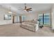 Spacious living room featuring lots of natural light and neutral decor, ready for personalized touches at 2391 Piedmont Lakes Blvd, Apopka, FL 32703