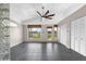 Sun Room with view of the large back yard, vaulted ceiling, and closet space at 2391 Piedmont Lakes Blvd, Apopka, FL 32703