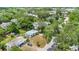 Aerial view showcasing the home's setting within a lush, tree-filled neighborhood at 2525 Lafayette Ave, Winter Park, FL 32789