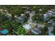 Aerial view of a charming residential property with clearly marked boundaries, surrounded by lush greenery and nearby neighborhood amenities at 2525 Lafayette Ave, Winter Park, FL 32789