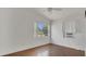 Bright bedroom with natural light, hardwood floors, neutral walls, and a ceiling fan at 2525 Lafayette Ave, Winter Park, FL 32789