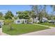 Beautifully landscaped front yard with a well-maintained lawn and easy street access at 2525 Lafayette Ave, Winter Park, FL 32789