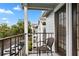 Comfortable outdoor balcony perfect for sitting, with a view of the neighborhood at 2550 N Alafaya Trl # 2304, Orlando, FL 32826