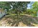 Large backyard featuring mature trees offering plenty of shade at 2710 W County Road 44, Eustis, FL 32726