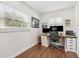 Comfortable office with a large window and hardwood floors, perfect for working from home at 280 E Bay Ave, Longwood, FL 32750