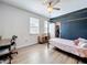 Bedroom featuring a stylish four-poster bed, closet, ceiling fan, and wood-look flooring at 3184 Pinenut Dr, Apopka, FL 32712
