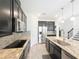 Well-equipped kitchen featuring stainless steel appliances, granite countertops, and a functional layout at 3184 Pinenut Dr, Apopka, FL 32712