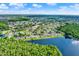 Lakefront community featuring attractive homes, lush landscaping, and beautiful lakes at 3249 Sandy Shore Ln, Kissimmee, FL 34743